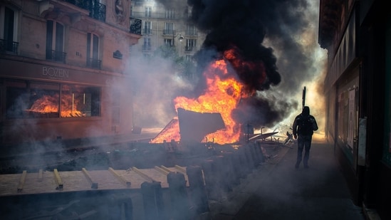 Most were peaceful but violence broke out in the capital, where police arrested 54 people, including a woman who attacked a fireman trying to put out a fire, Interior Minister Gerald Darmanin said on Twitter.  Eight police were injured, he added. (AFP)