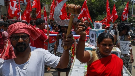 Members of the Center of India Trade Unions (CITU) take out a rally to mark May Day in Hyderabad, India.(AP)