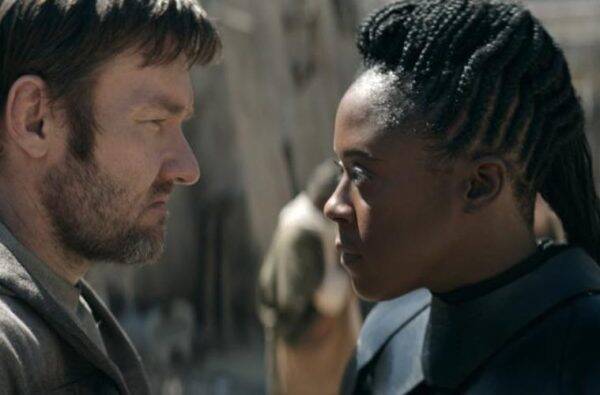 Joel Edgerton, left, and Moses Ingram in a scene from the series 